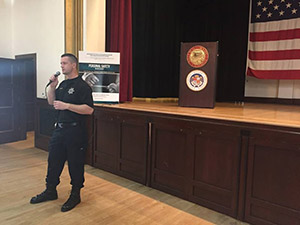 Officer speaking